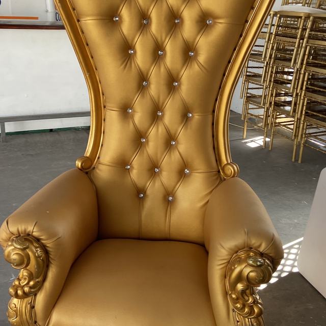 Gold tufted throne chair
